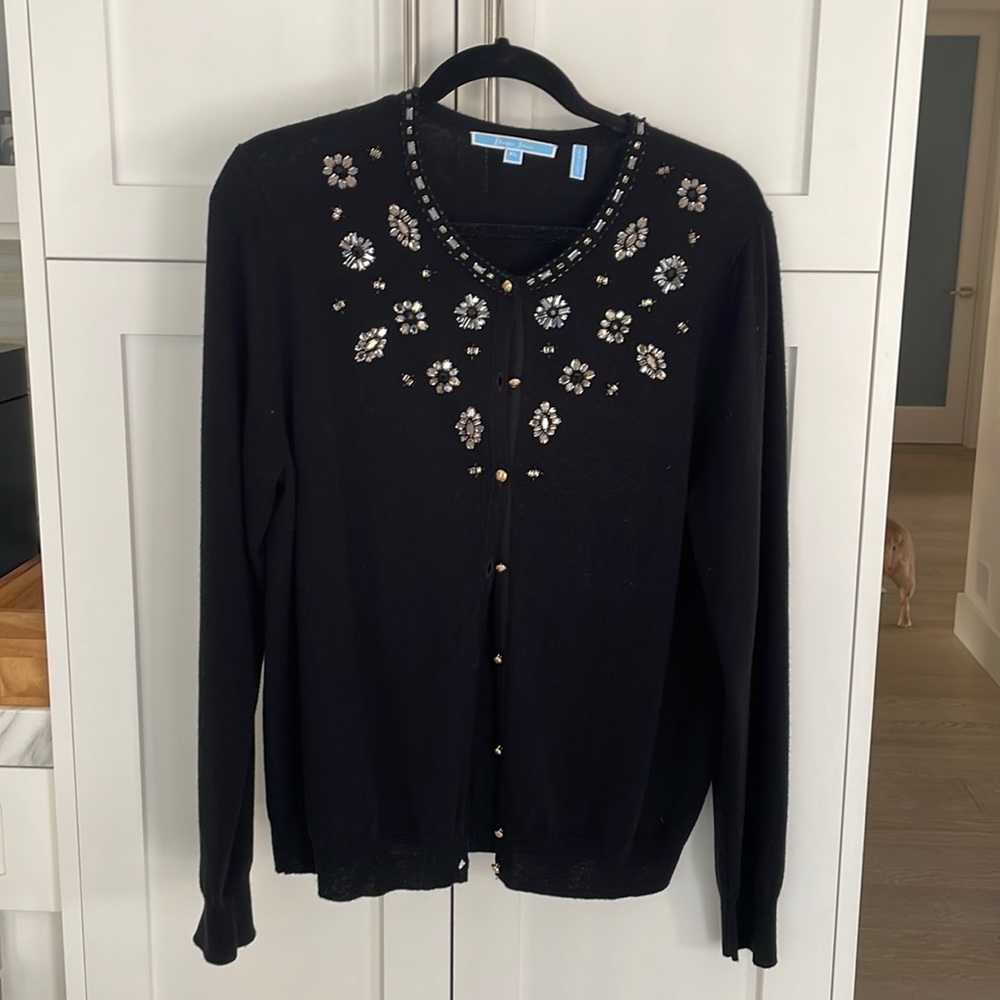 100% wool (very soft-feels like cashmere)